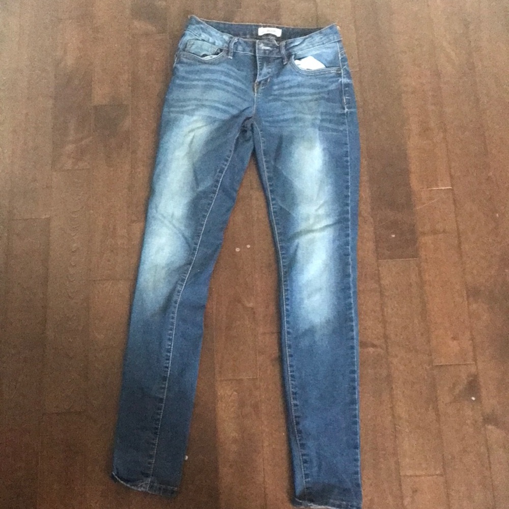 This is a skinny Denim and have a little booty cut